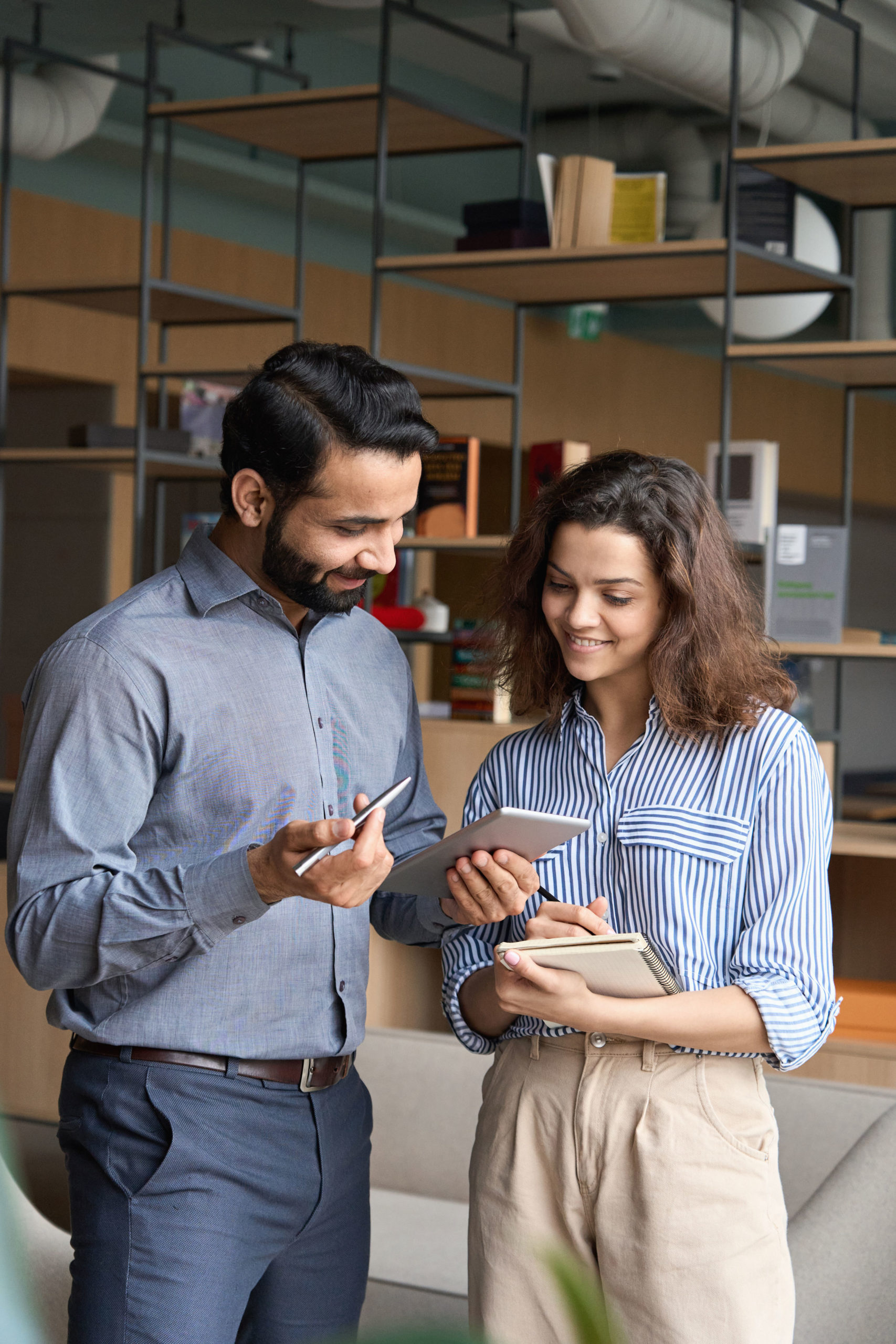devops-workers-looking-at-a-computer